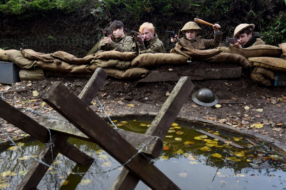  Keen historians Reuben, centre right, and Ethan, right, couldn't wait to wait to invite their friends round to do battle