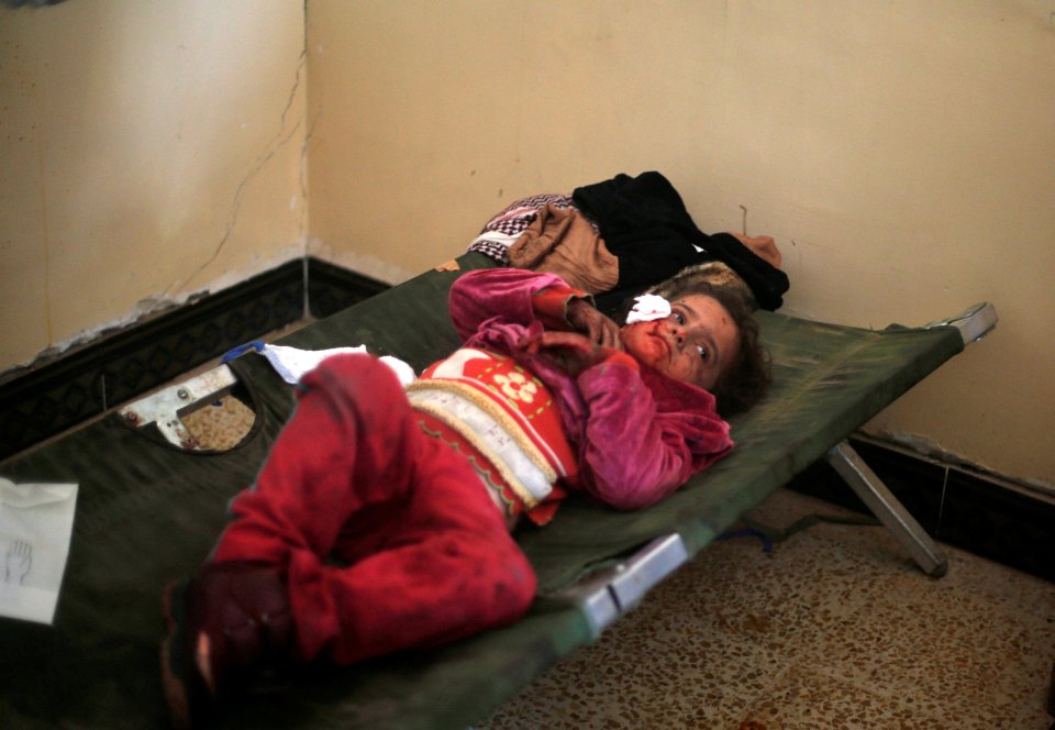  An injured Iraqi girl is seen here recovering at a field hospital in al-Samah neighborhood