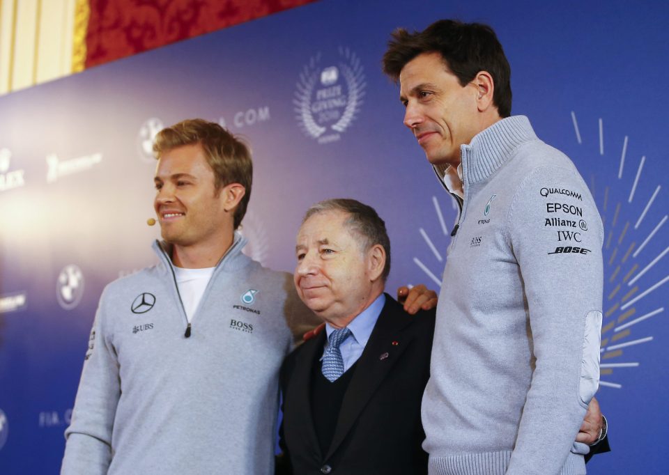  World Champion Nico Rosberg of Germany poses with Mercedes Executive Director Toto Wolff