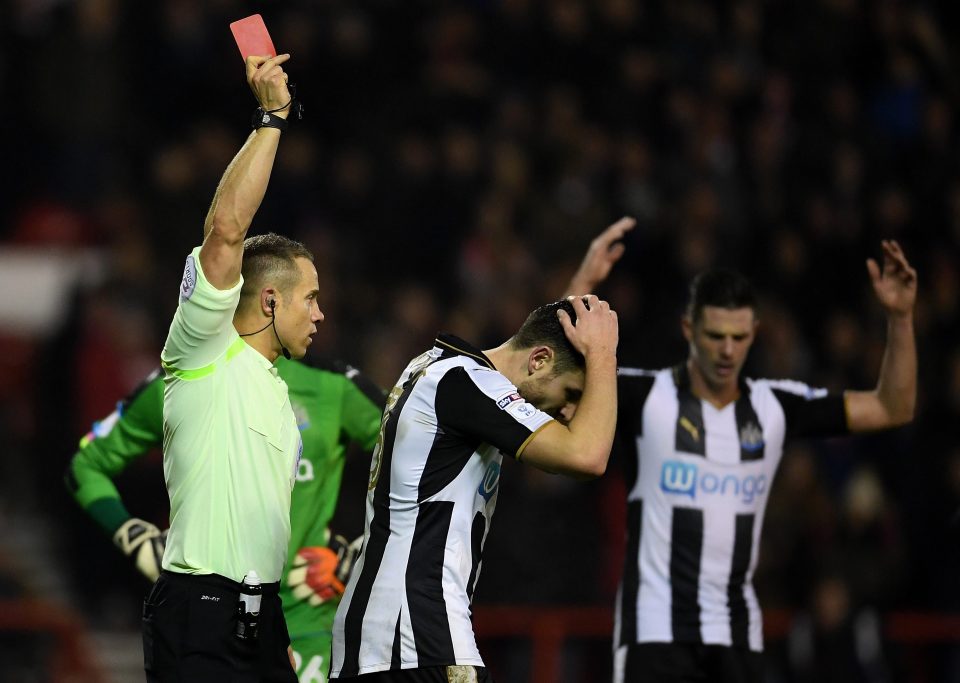 Paul Dummett gets his marching orders after giving away a penalty