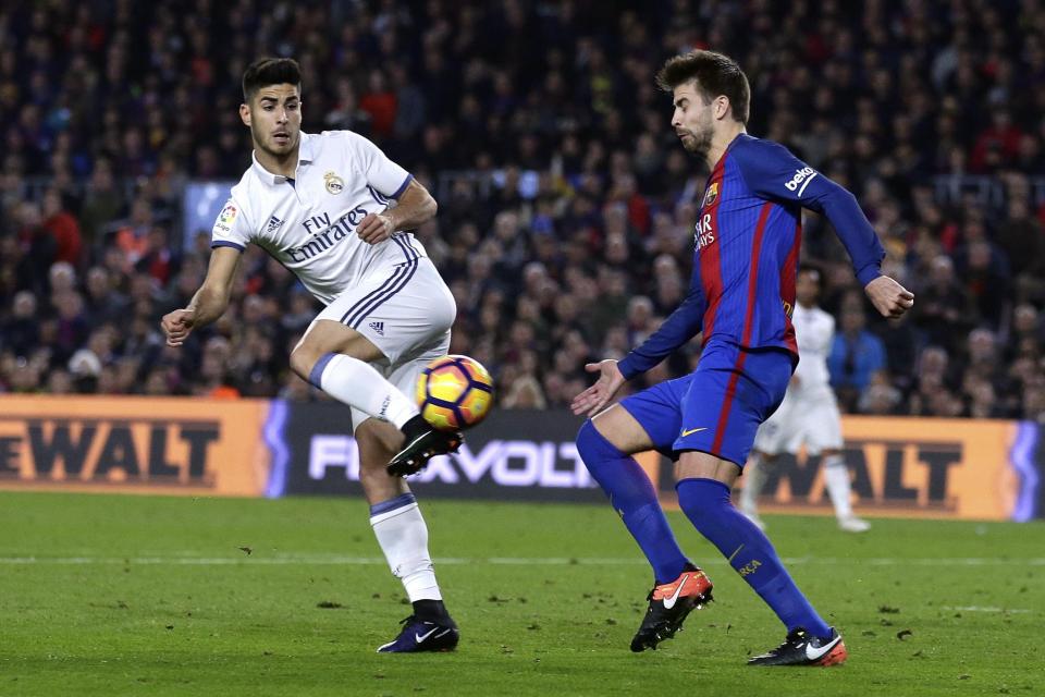  Asnensio in action for Real against rivals Barca in El Clasico