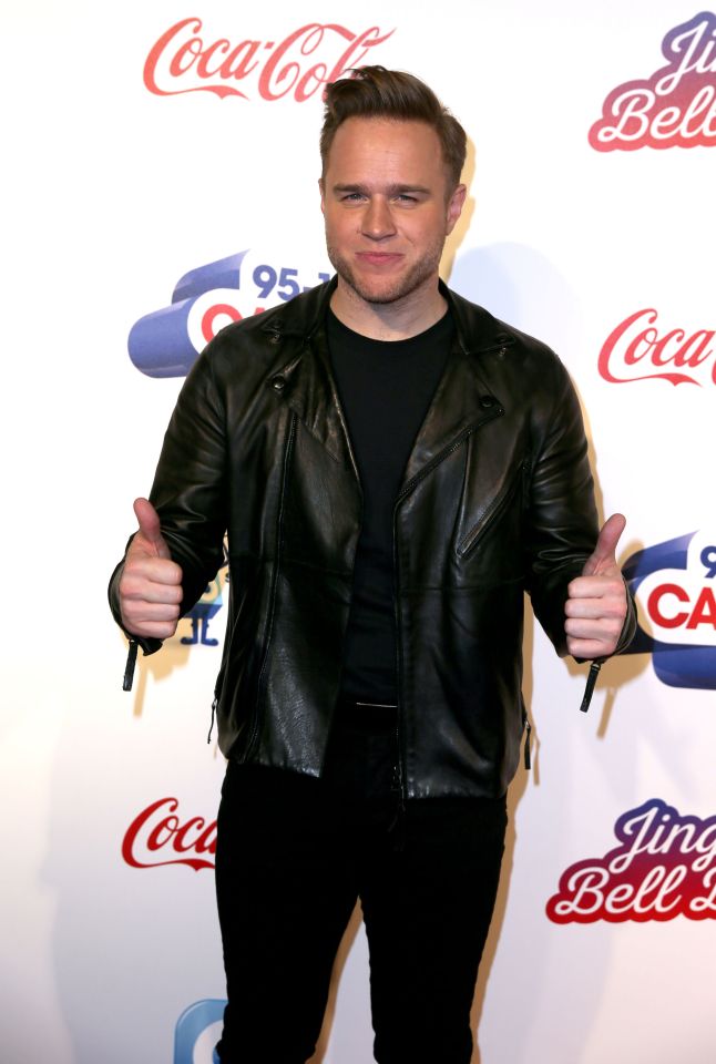  Olly gave thumbs up outside