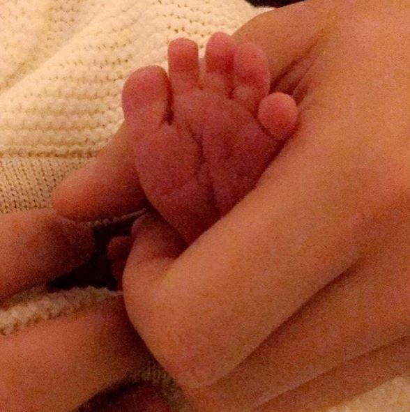  Dapper has posted a picture of the baby's foot - but has sworn to keep the tot off the internet