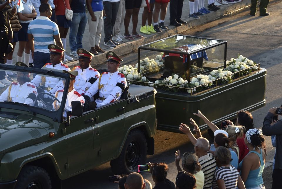  While some people desperately cried out to the procession, others said the funeral brought up distressing memories of Castro's rule