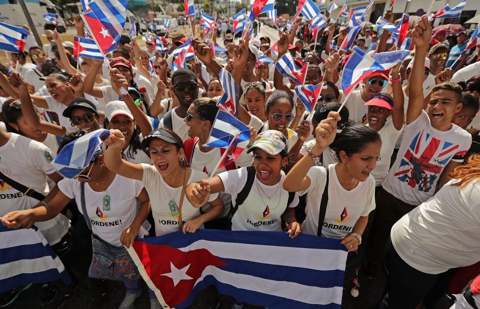  Young people march around the Plaza de la Revolucion and chant 'Yo soy Fidel,' 'I am Fidel' in English