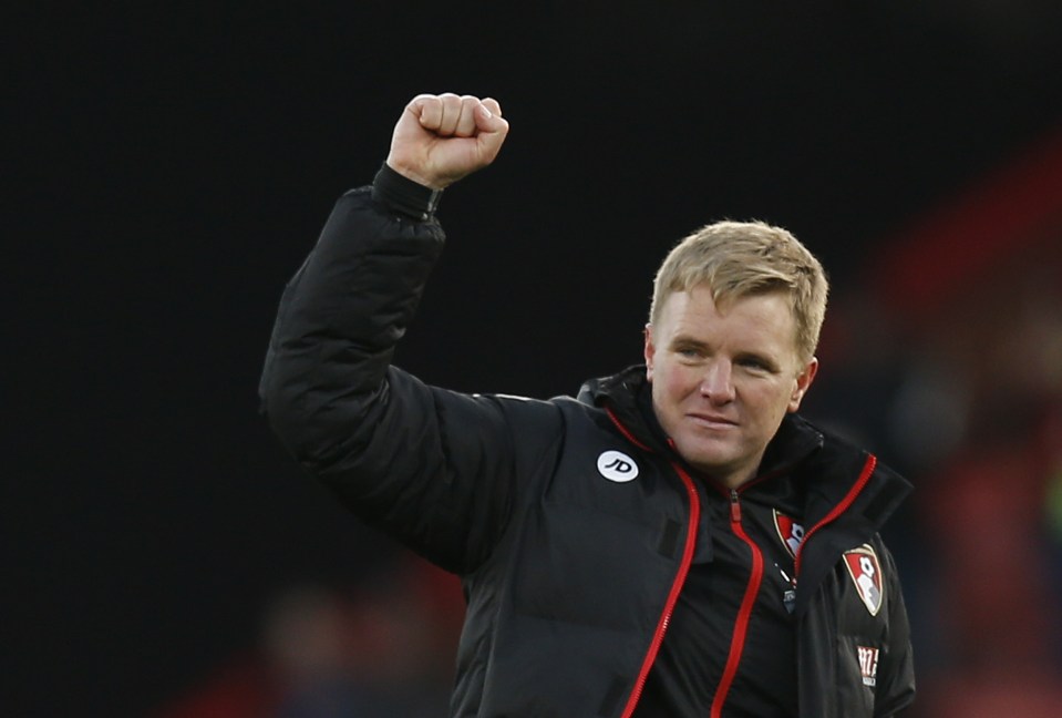  Eddie Howe raises his arm in triumph after securing a fantastic victory