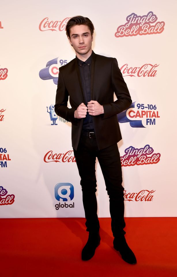  George Shelley looks very dapper in his dark suit