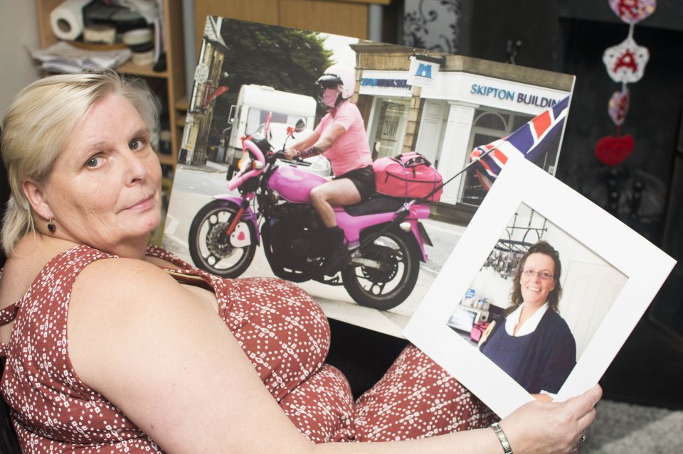  Lorraine Allaway, from Skipton, North Yorkshire, holds a picture of her husband Bob, and her sister Ellen