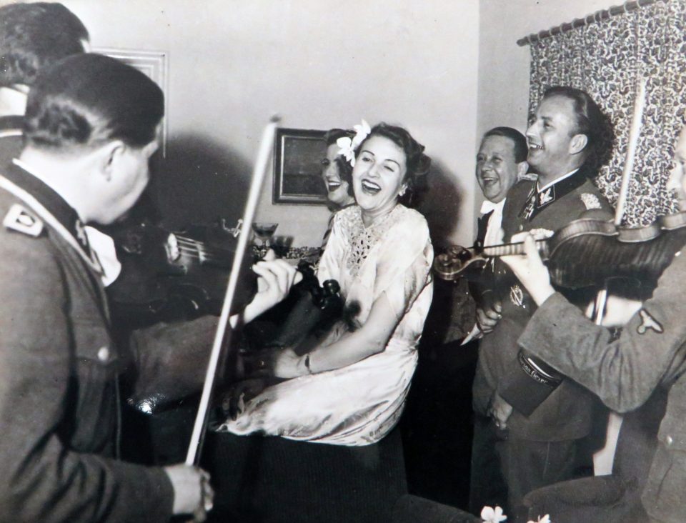  New bride Gretl Braun being serenaded by Nazi musicians