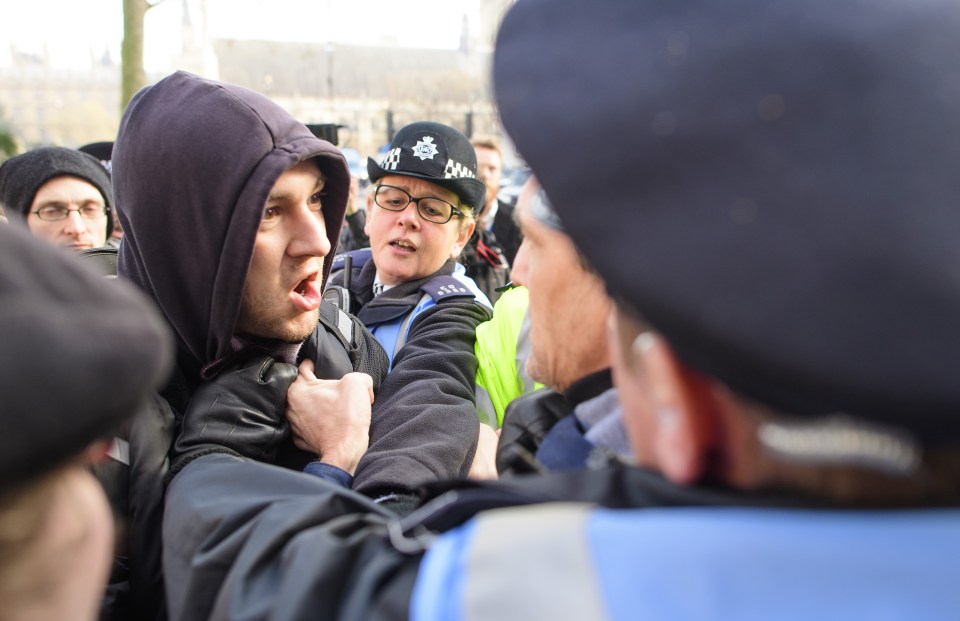  Two men got into a fight outside the court today as judges listened to the appeal