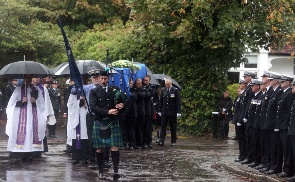  Terrible shame . . . cops at the funeral of PC Andrew Duncan after tragic death