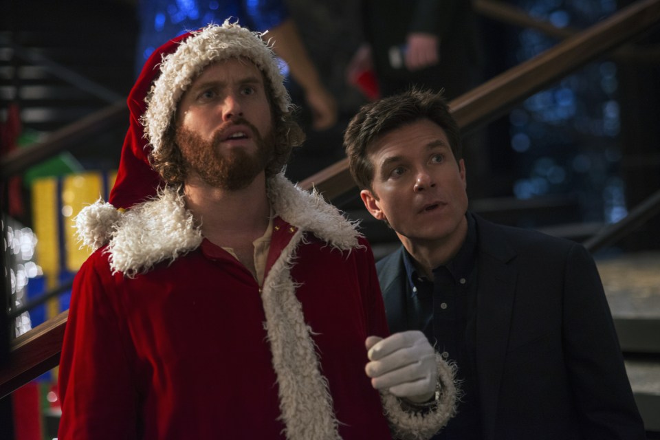  Office Christmas Party features TJ as Clay and Jason Bateman (right) as Josh Parker