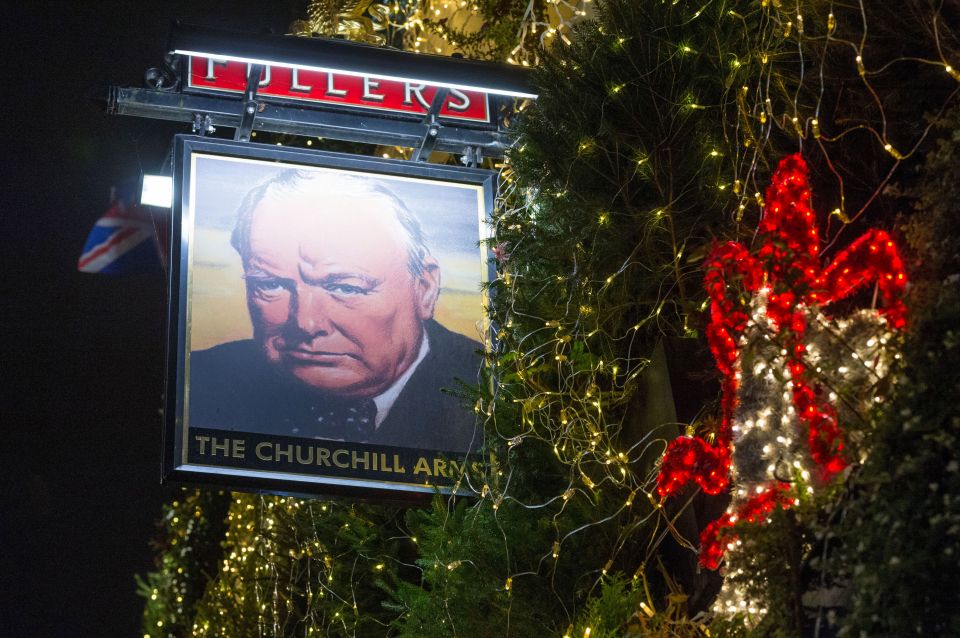  Even Churchill looks chirpier next to the pub's festive cheer