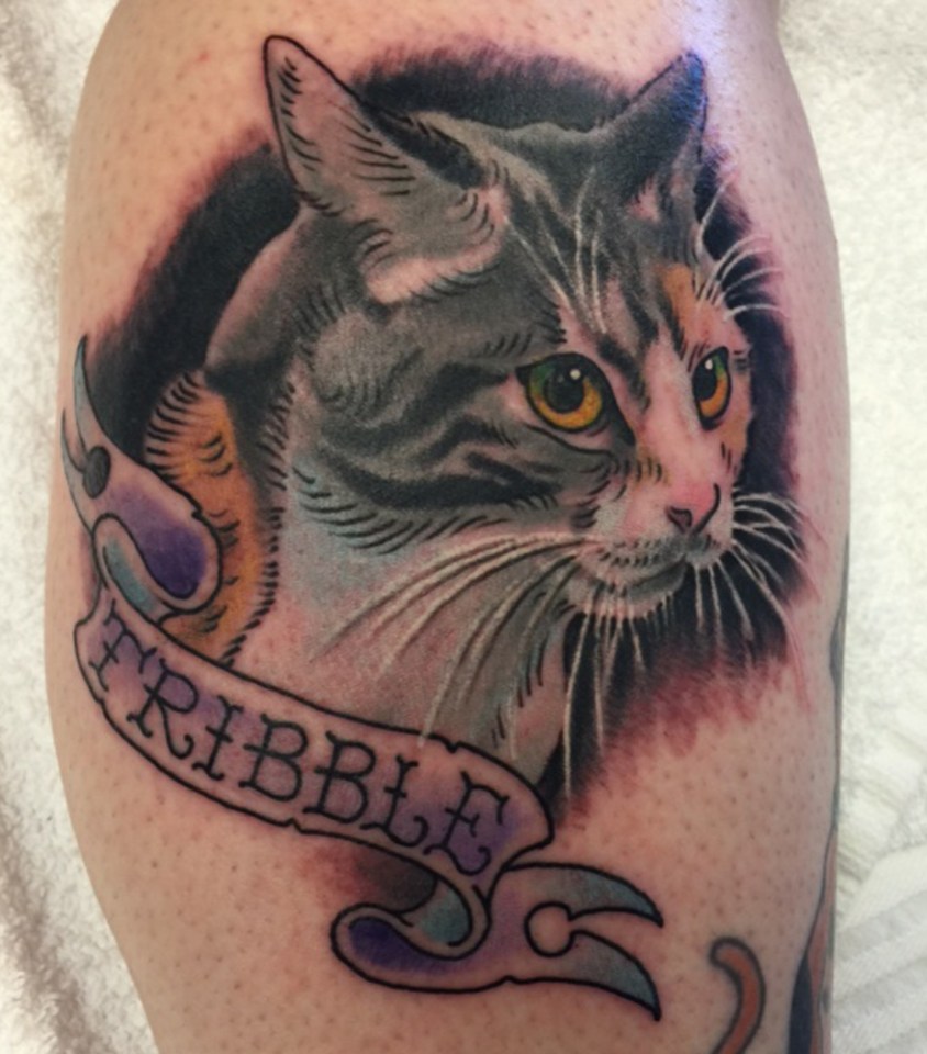  Heather had Tribble's ashes mixed into ink and then tattooed on to her body