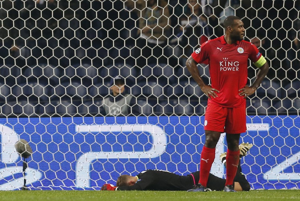  Leicester City's Wes Morgan and Ben Hamer look dejected after FC Porto's third goal