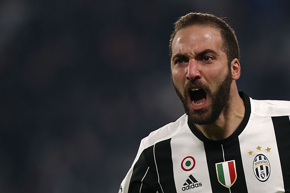 Gonzalo Higuaincelebrates after scoring during the UEFA Champions League 