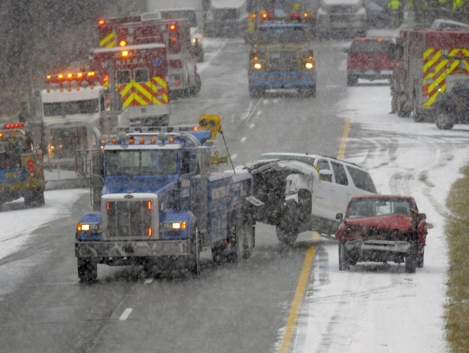  Emergency crews worked at the scene of a multiple car pileup on the I-96 between Webberville and Fowlerville