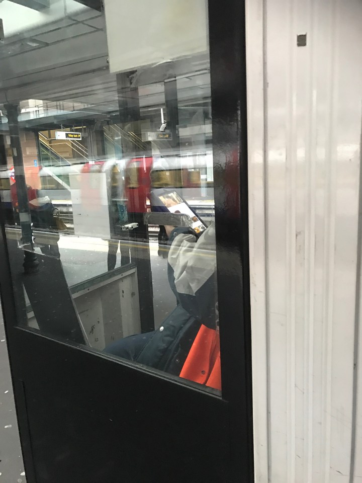  A shocked commuter took a picture after spotting a London Underground tube worker 'watching porn' on his tablet at Wembley Park station