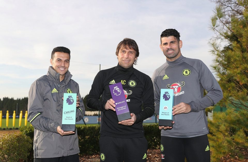  Pedro with boss Antonio Conte and striker Diego Costa holding their Premier League awards