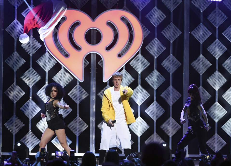  Justin Bieber performed on stage in a canary yellow hoodie