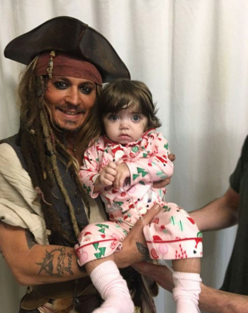  The Hollywood star put on his famous Pirates of the Caribbean costume to bring some festive cheer to sick kids