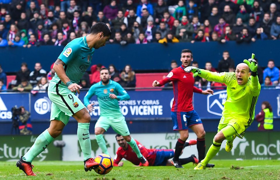  Luis Suarez passes into an empty net after a good team move