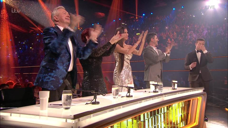  The judges and crowed gave Louis a standing ovation