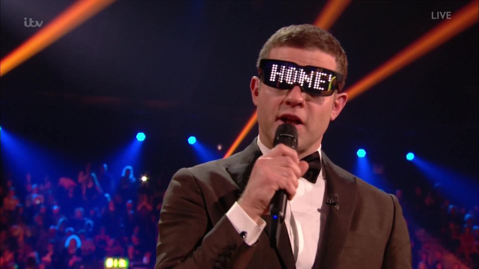  She even got host Dermot O'Leary to wear some...