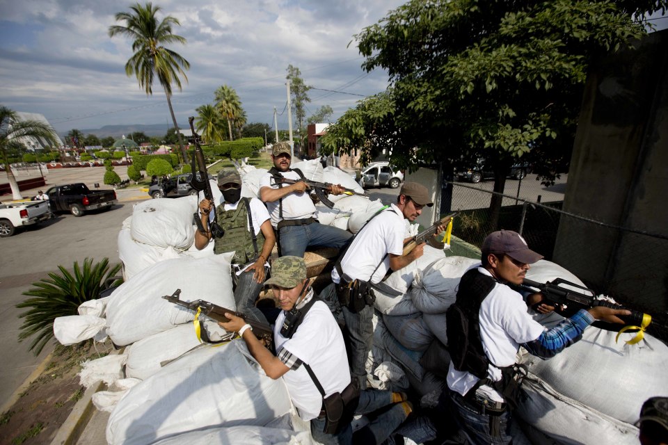  Citizens also formed 'self-defence' militias, like these in Michoacan, to take on the cartels