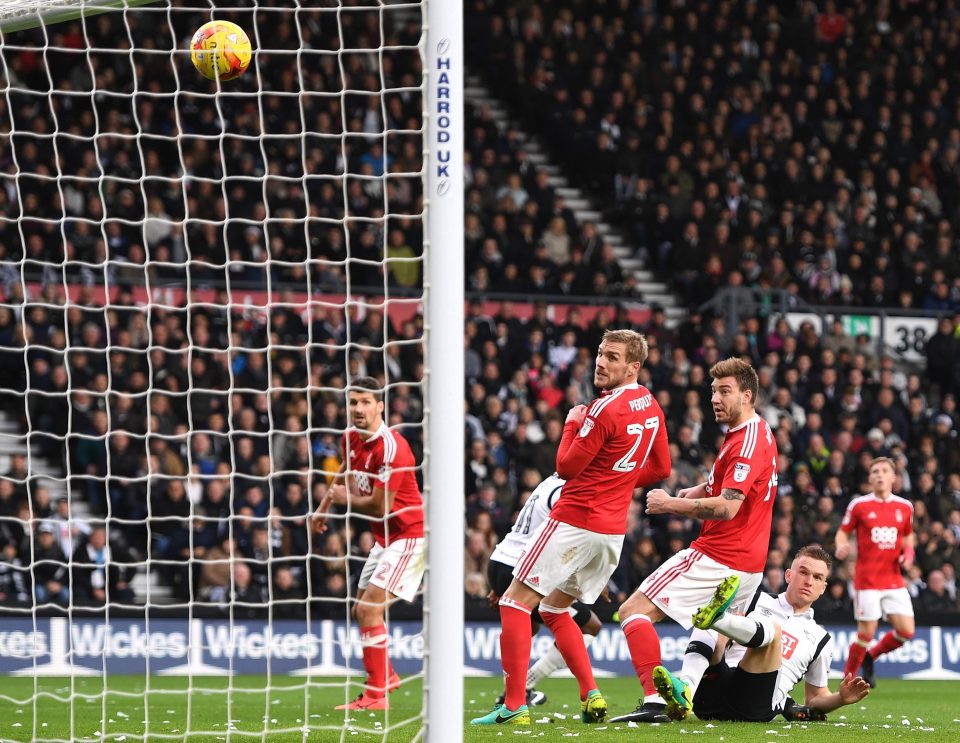 Johnny Russell's flick on hit Bendtner in the face and flew into the net