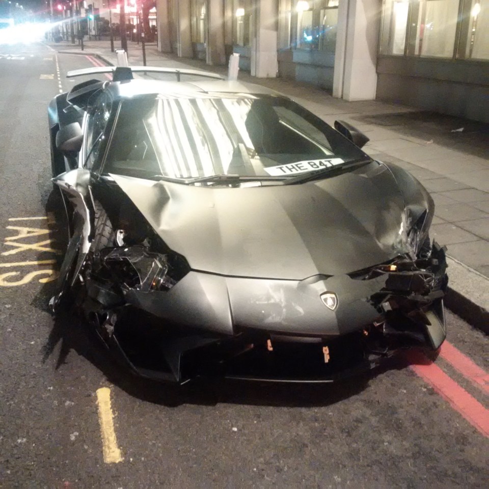  The jet black supercar's lights were smashed in the three-car collision on Park Lane in Mayfair last night