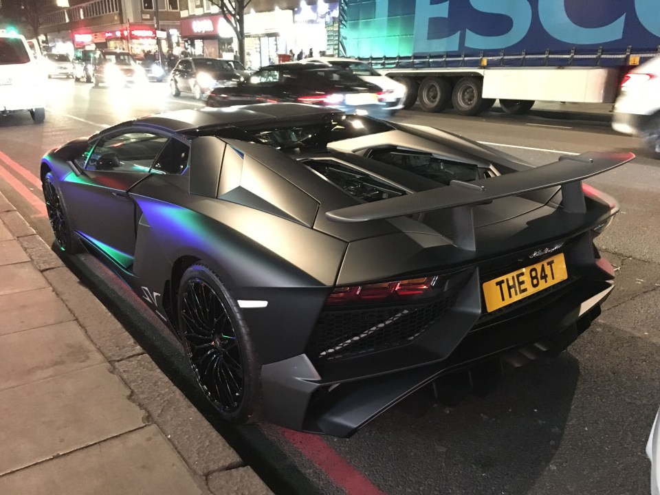  Top rear: The supercar has black alloy wheels and a slick-looking spoiler