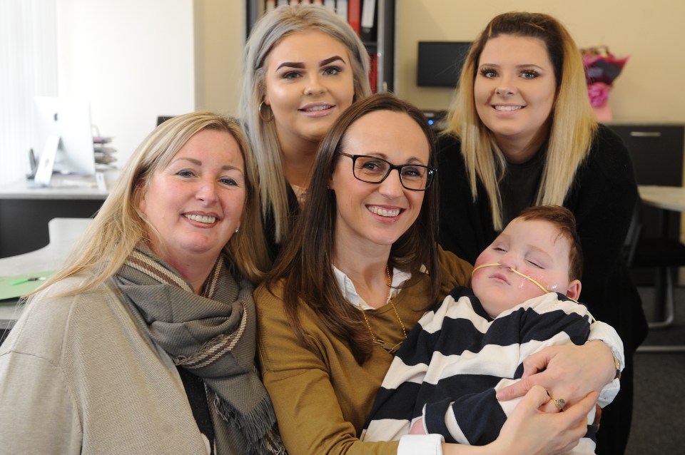 Gillian Bayford with Jenny and Blake McMillan and staff from her property business