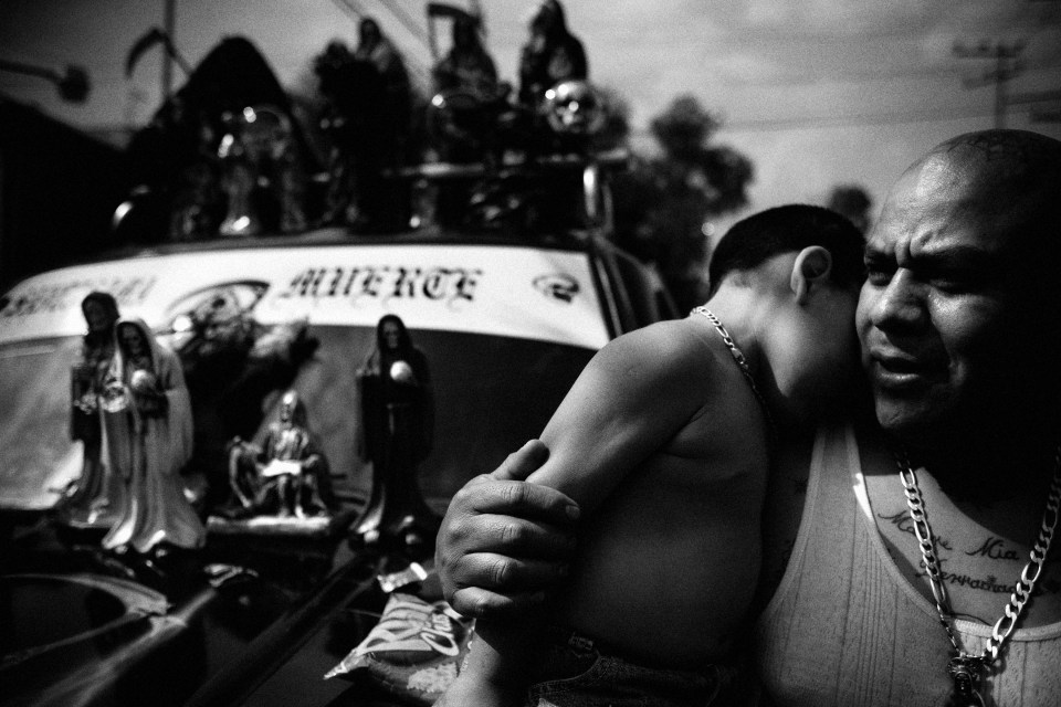  Ex-convict 'Gerardo' holds his son on the streets of Tepito, the roughest neighbourhood in Mexico City