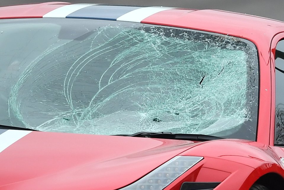  Six people were rushed to hospital after the supercar ploughed into them this morning