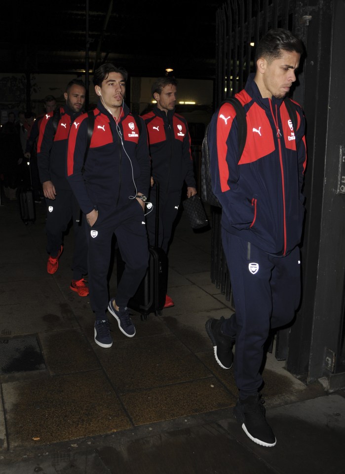 Arsenal's players walked down the street as they arrived in Liverpool