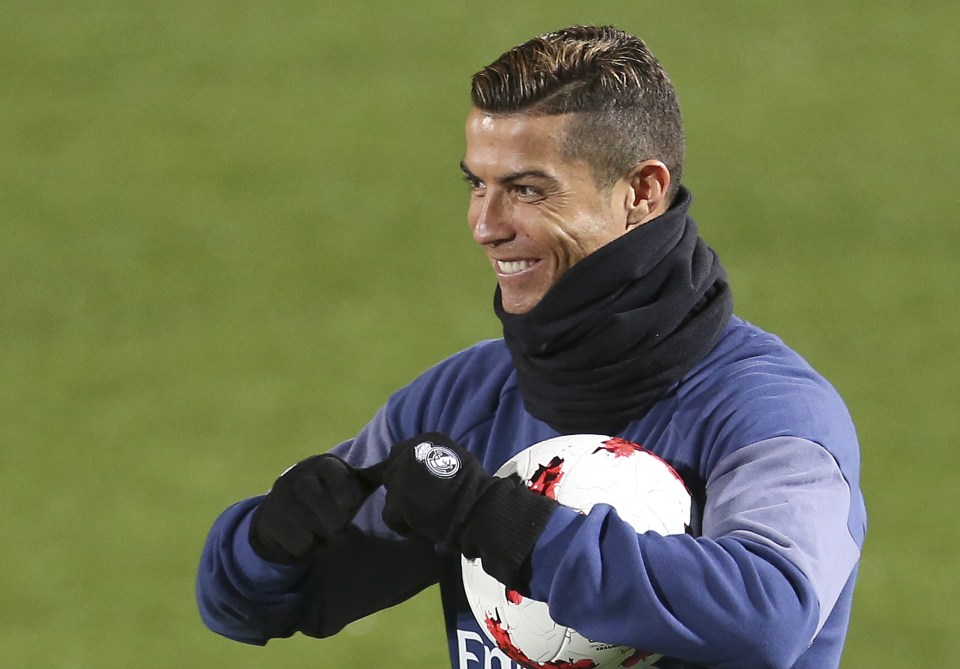 Cristiano Ronaldo is all smiles as he gets back to work with Real Madrid