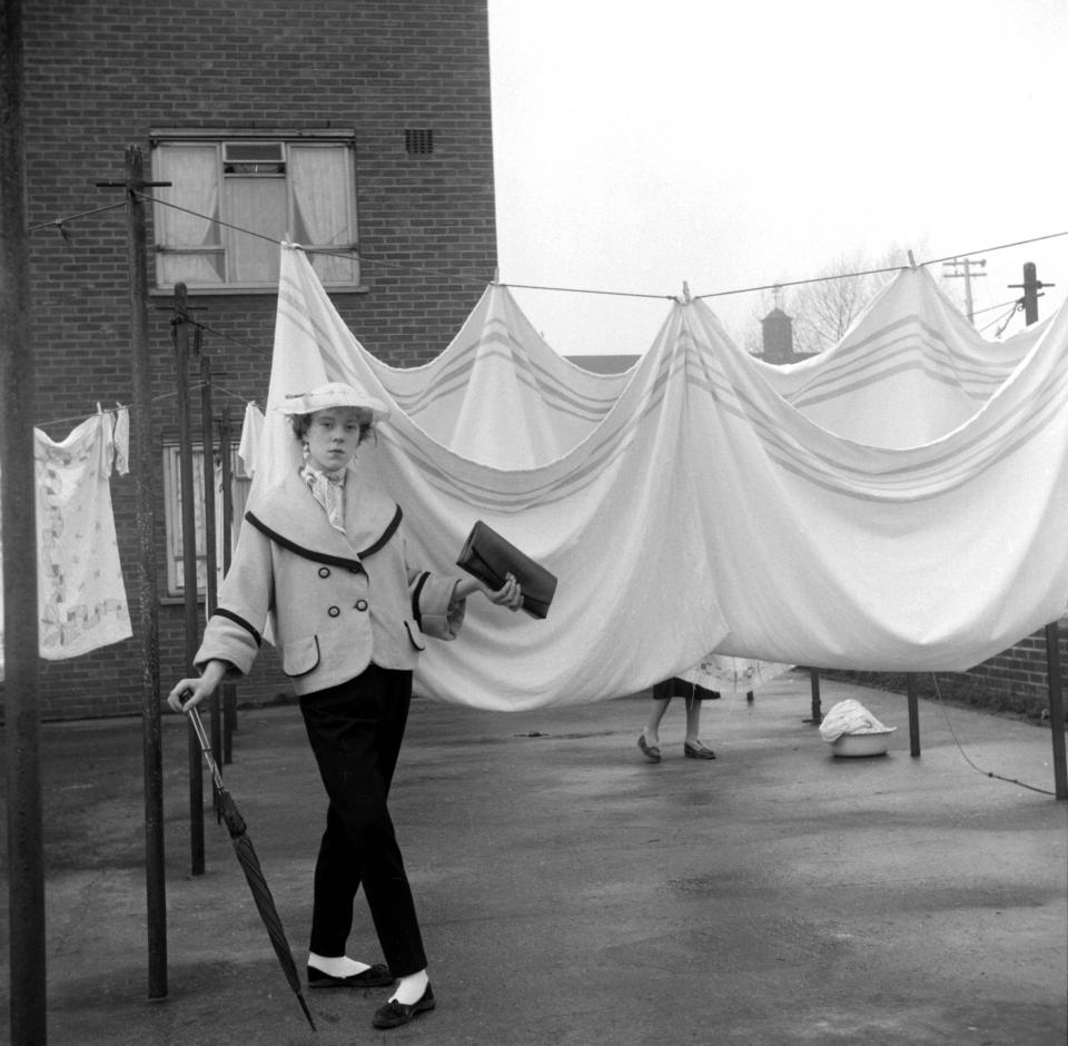  'Laundry Lady' Iris Thornton, 17, posing in the backyard of the block of flats near her home in Plaistow