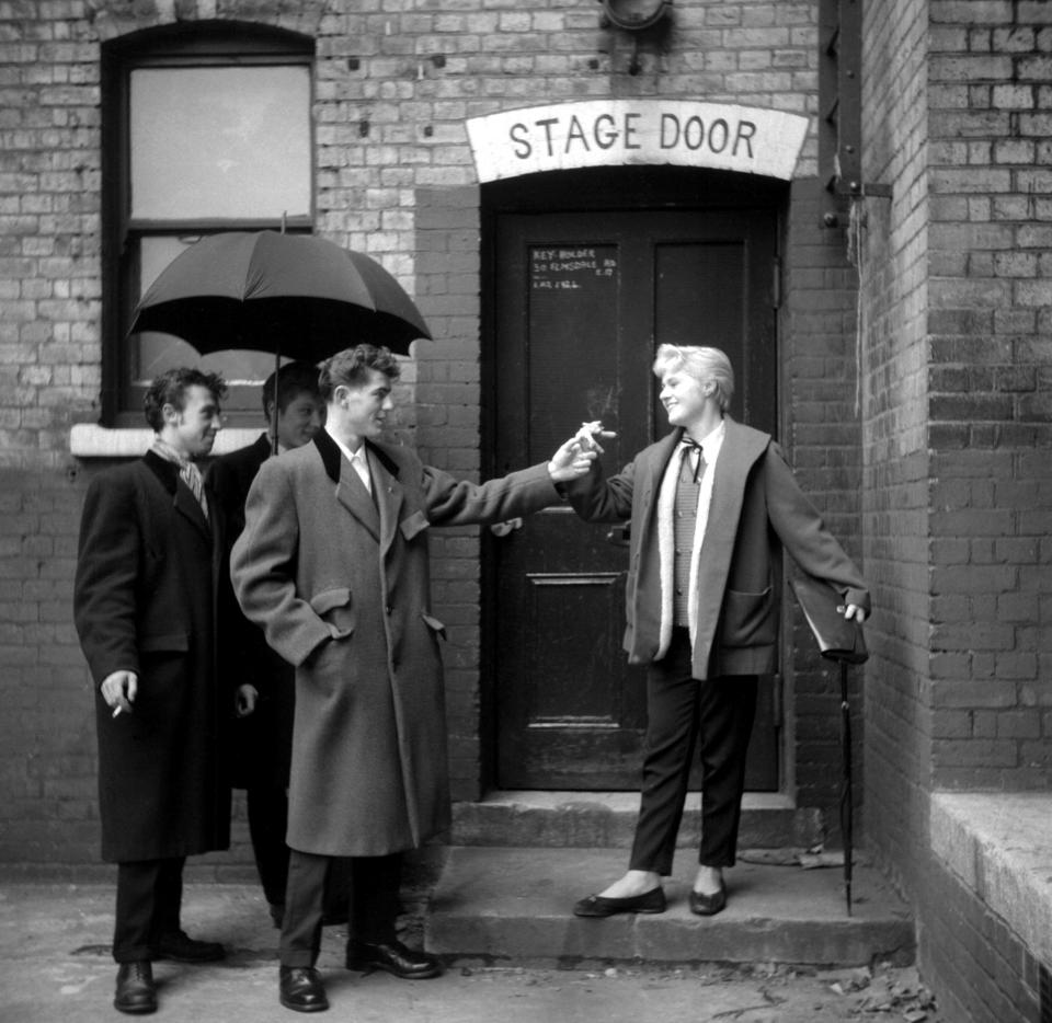  Teddy girl Josie Buchan poses at the stage door of the Walthamstow Palace Theatre which was pulled down in 1960