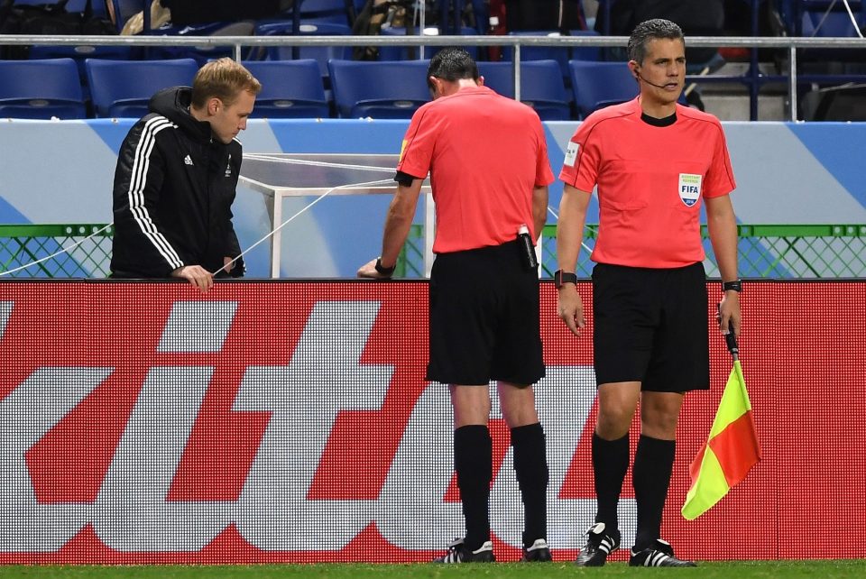  After watching an instant replay for about 15 seconds, the referee awards a penalty