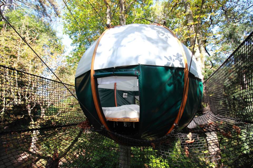  This bubble tent is suspended above the ground in a French forest