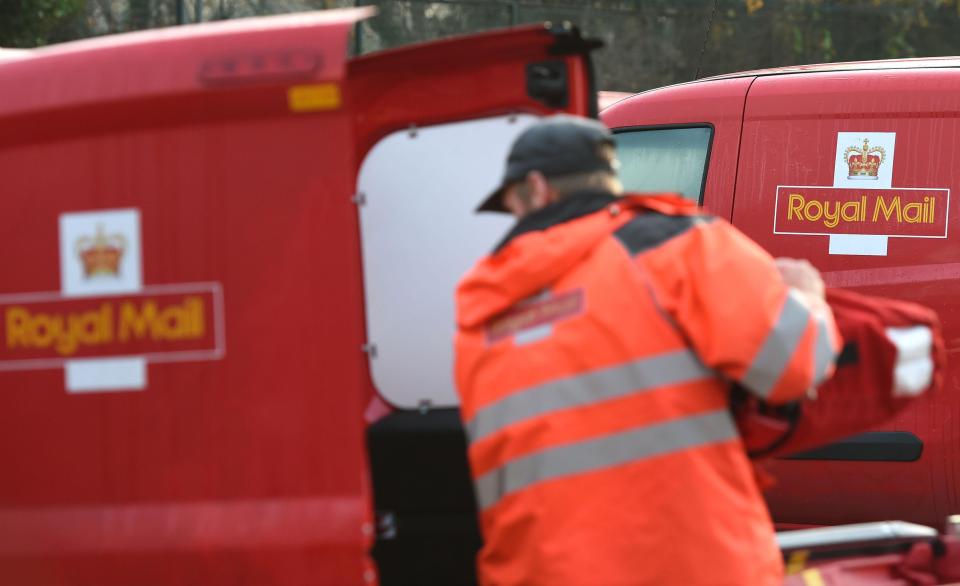  A postman loads his van at Nottingham Mail Centre which will process more than 2.8 million items of post on their busiest day of the year