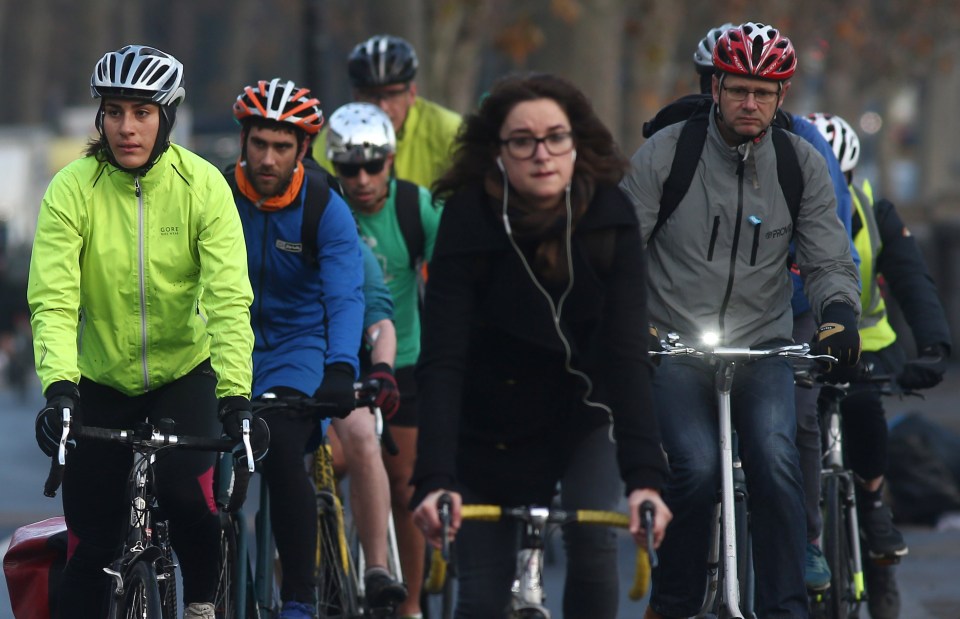  People cycle along a super highway in London on the second day of the Southern strikes