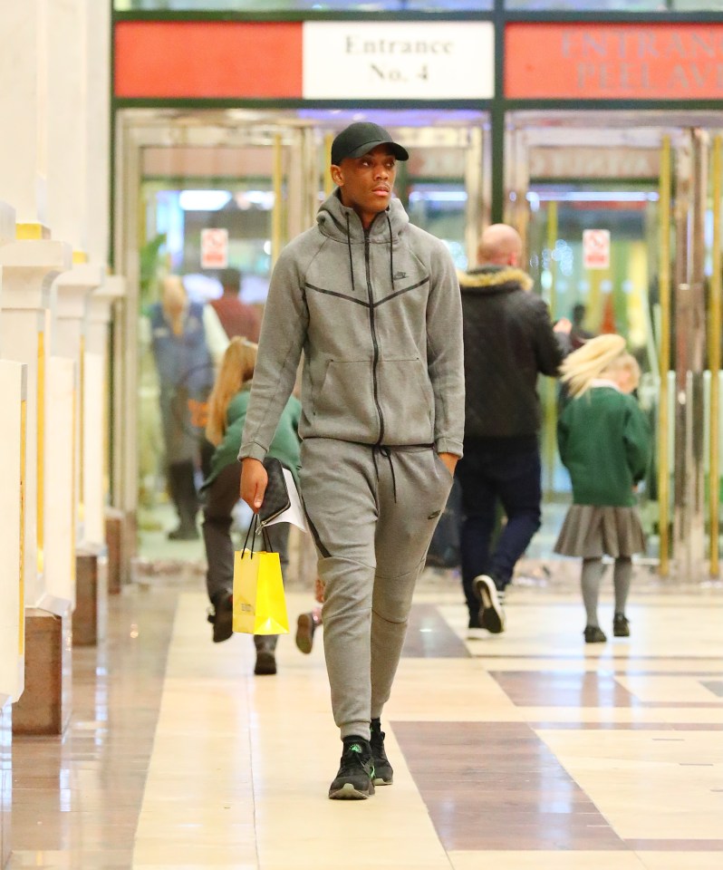  Martial was holding a Selfridges bag whilst on his shopping trip