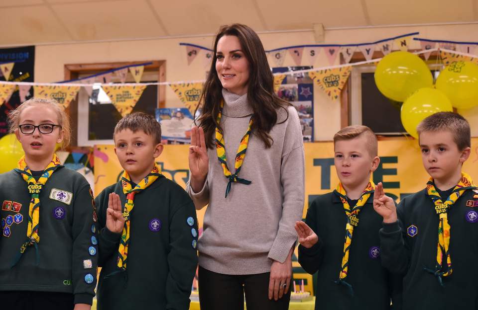  Kate lines up with Cub Scouts for salute