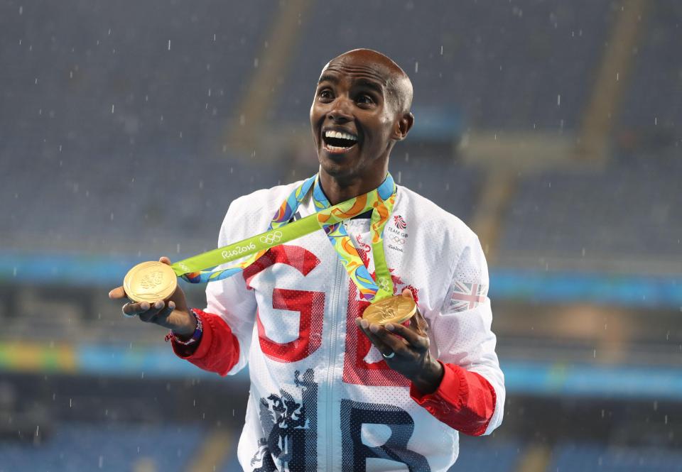 Farah with his two gold medals from this Summer