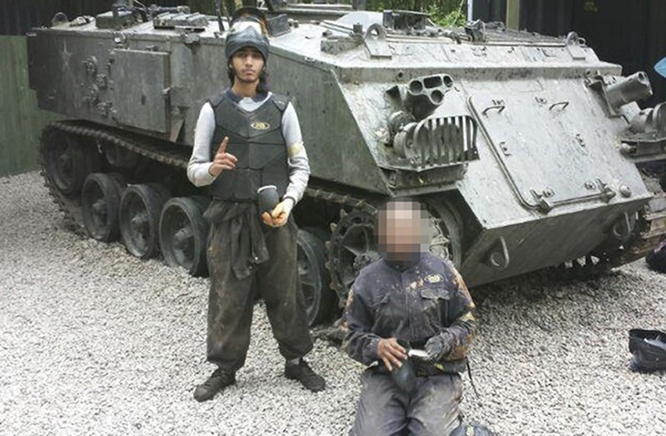  Humza Ali pictured here posing in front of a tank at a paintballing centre while on "training exercises"