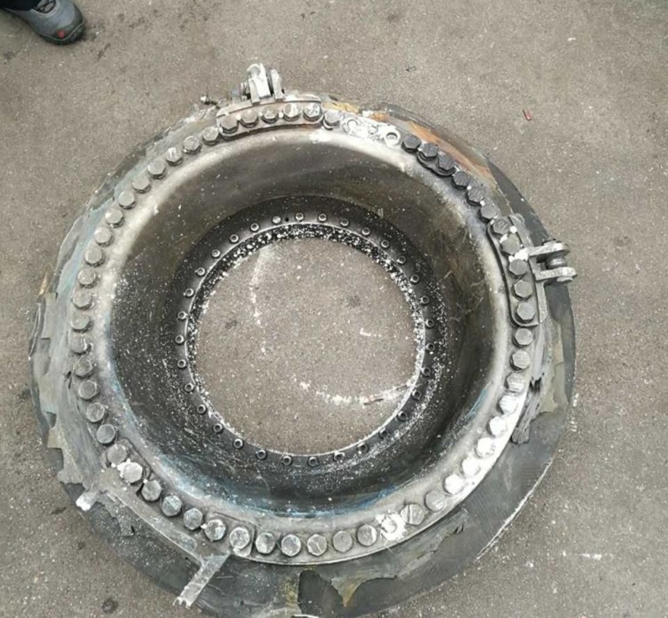  Police found a large metal ring in the surrounding areas of the crater