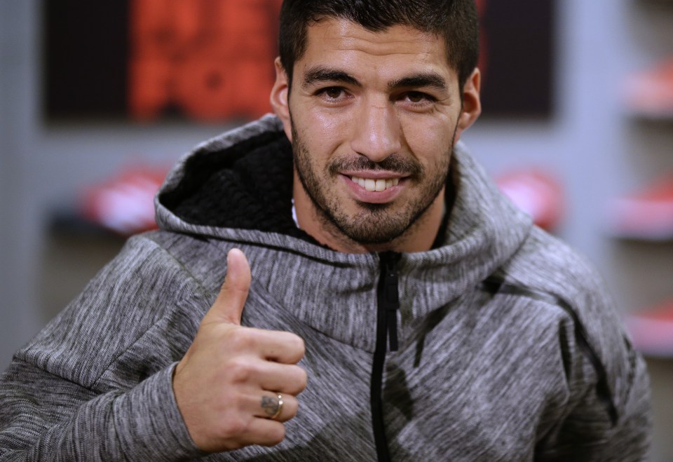  Luis Suarez has put pen to paper on a new deal at Barcelona