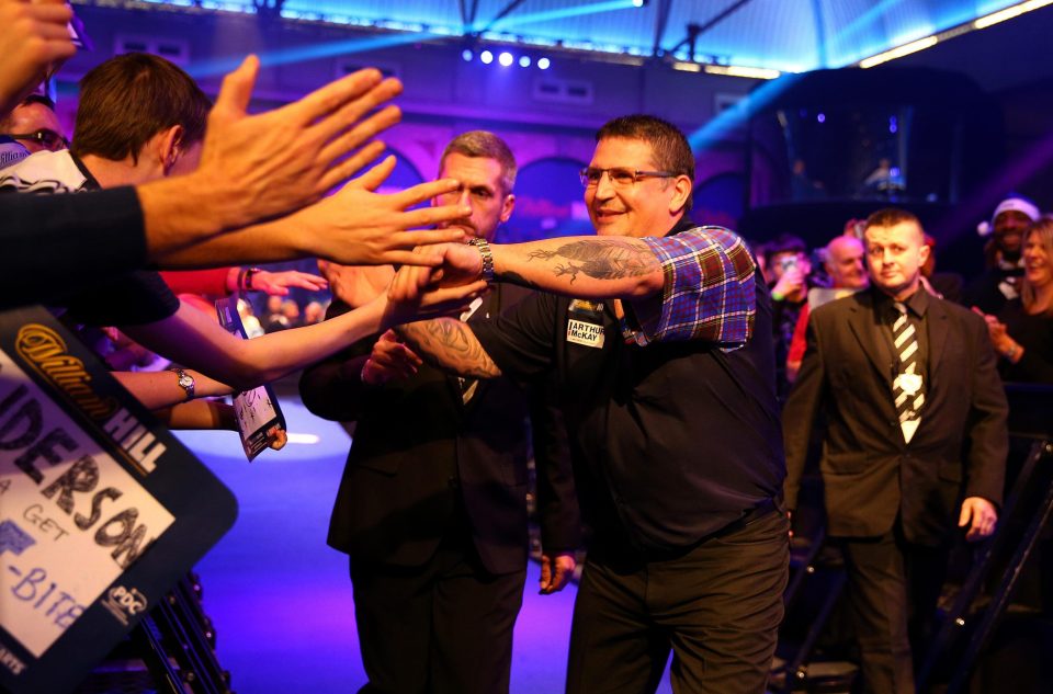 Anderson makes his way to the stage on the opening night at Alexandra Palace